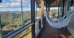 Casa com vista e Araucárias. Perfeita para a família – Condomínio Amigos do Rancho – Rancho Queimado – SC