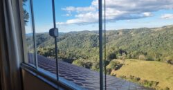 Casa com vista e Araucárias. Perfeita para a família – Condomínio Amigos do Rancho – Rancho Queimado – SC